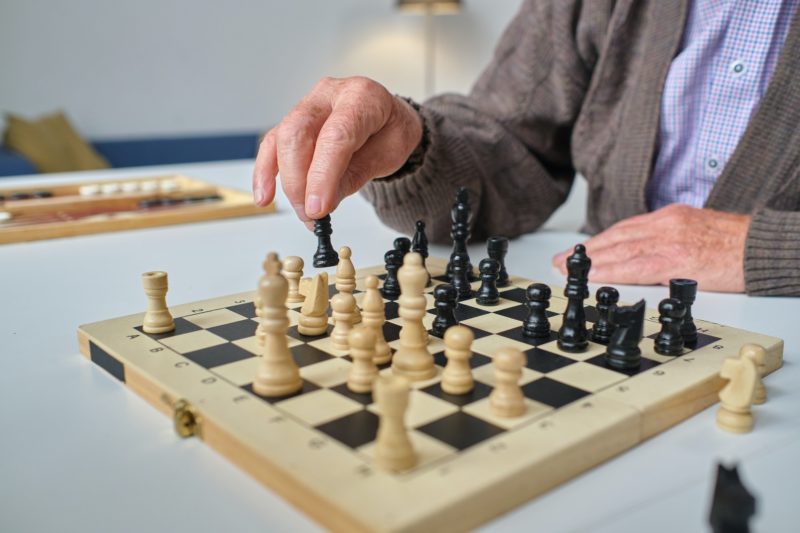 Senior man playing chess